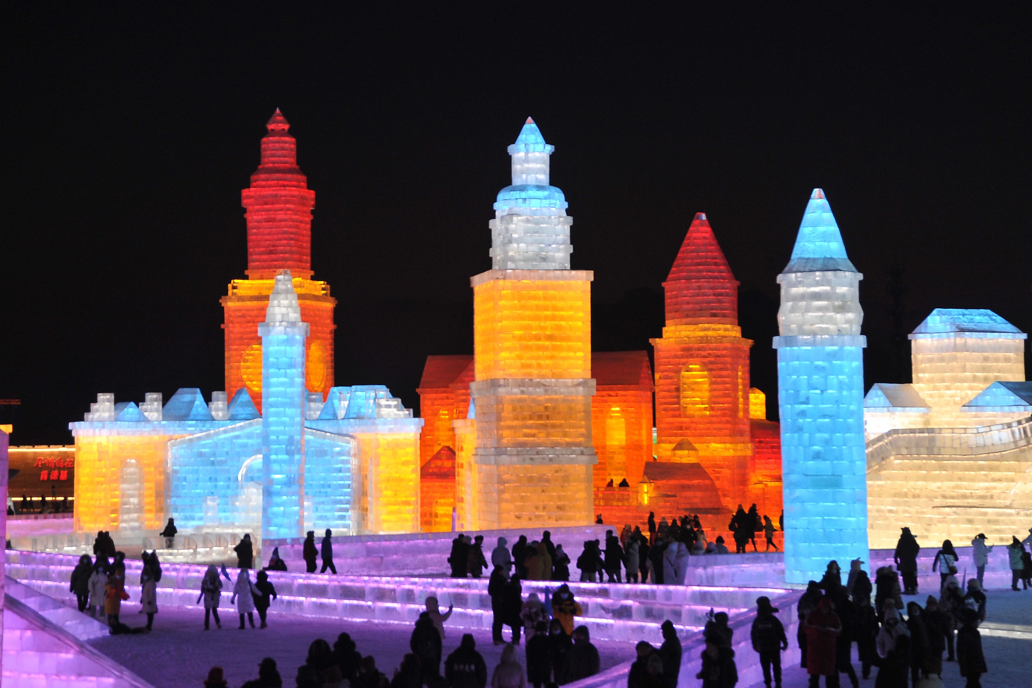 Illuminated ice sculptures at Harbin Ice and Snow Festival